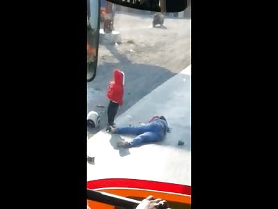 Heart Breaking Video Shows Little Boy Standing Crying at his Mothers Side Who Was Killed in an Accident