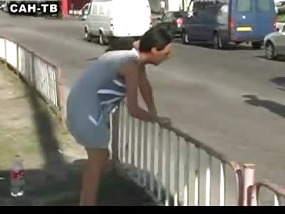 Crying from the Sidelines, Wife watches as Technicians take a Truck off of her Husband