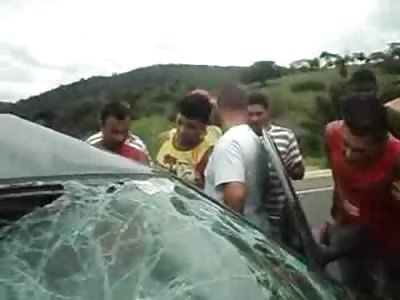 Huge Crowd Gawking at the Dead Guy