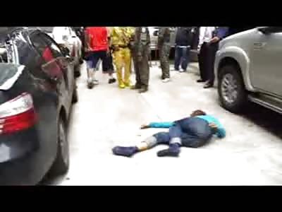 Laughing Cameraman records a Suicide Jumper who Landed on a Car..