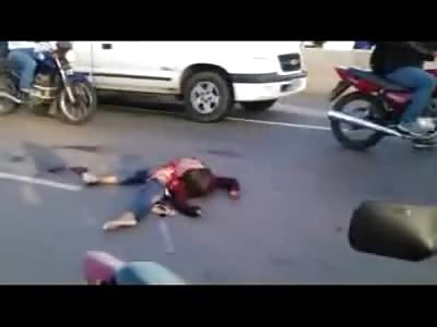 Pregnant Woman of 3 Months is Split in Half and her Head in a Bag down the Road