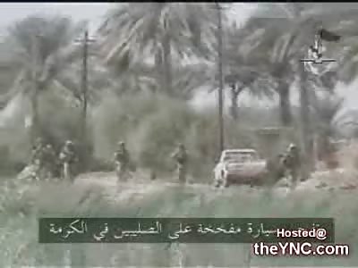 American Foot Patrol walks by a Vehicle Born IED as it Detonates