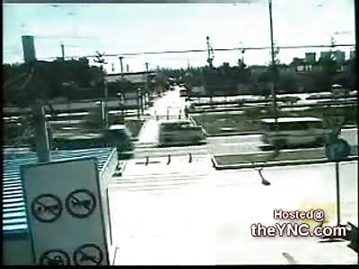 Biker completely flattened by a Dump Truck