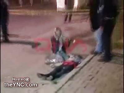 Transvestite Lover cries over its Lover's Dead Body and yells at the Camera Crew