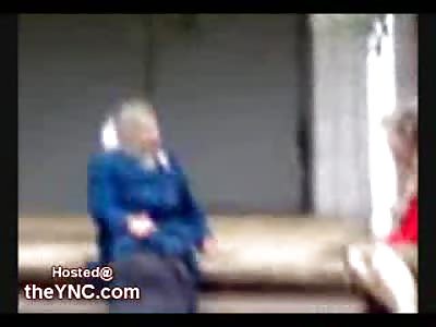 Old Russian Ladies beat each other with their Hand Bags