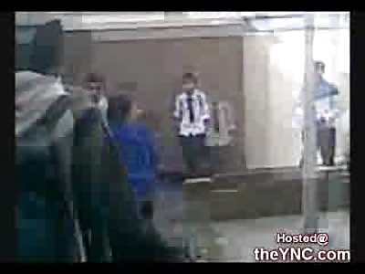 Asian Kid pounds a Black Kid against a Brick Wall