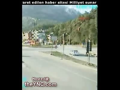 Oblivious Biker gets Flattened by a Dump Truck