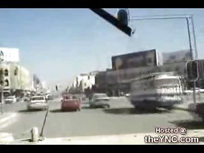 US Soliders Driving a Hummer Plow through Traffic