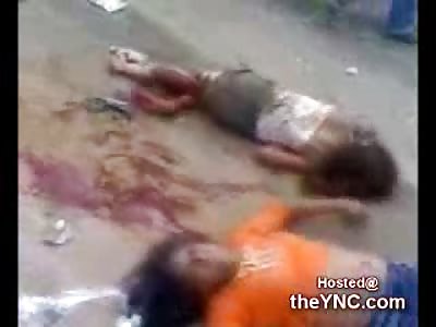 Shocking Video shows a Mother and Daughters Dead and Dying on the Road (Strong Warning 18+)