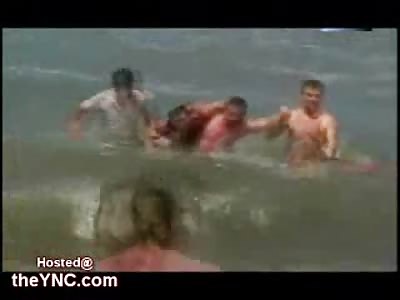 Father Turns his Drowning Daughter upside Down and tries to Shake the Water Out