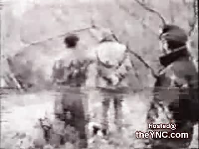 Brutal Footage  shows Execution, and a Russian Soldier squirming after having his Throat Slit