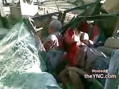 Headless Driver Rests his Head on his Passengers Shoulder