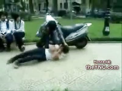 Guy Beats on, Kicks, Pulls Hair on a Female and tries to Rip Off her Shirt