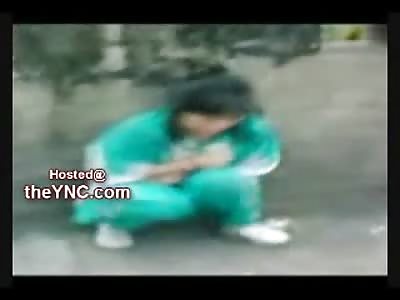 Chinese Shoplifter Kicked, Forced to Strip and then Sit Naked