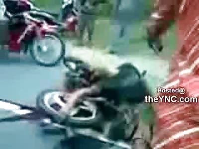 SHOCKING: Compassionate Onlookers try to Comfort a Man missing Half his Head yet Still Alive