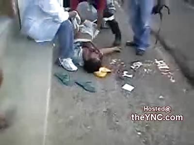 Man Murdered Lying Dead on the Street is Frisked 