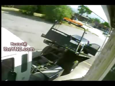 Worlds Worst Tow Truck Driver Runs Himself Over