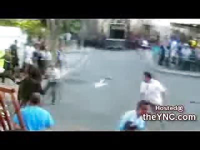 Gray Haired Man gets Put on his Face by Speeding Bull (Watch Slo Mo for Full Effect)