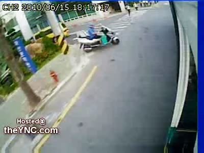 Female getting off Bus Blasted by Speeding Motorcyclist (Slo Mo then Normal Speed)