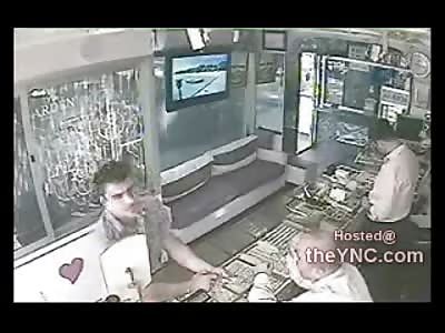 Worlds Greatest Customer Stops  Thug with a Gun trying to Rob Store 