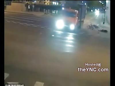 A Now DEAD BIker Runs Head First into a Garbage Truck