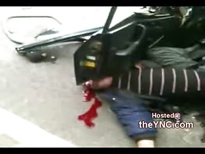 Guy Twisted out of His car Head Smashed on the Road by Door