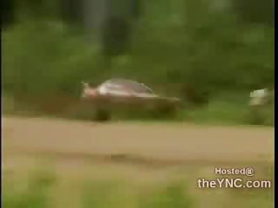 Lucky Bastard.....or Idiot I should say in the Middle of the Road in Rally Race