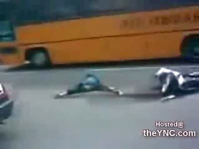 Deceased Female Rider in a Split on the Road while the Morning Commute doesnt Miss a Beat