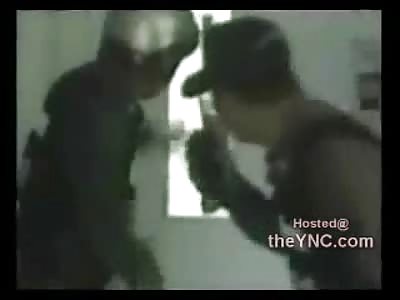 Bad Hostage Taker Kills Himself by Accident (Watch Slow Motion at End of Video through the Window)