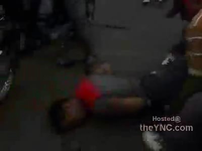 Crowd Not Waiting for the Ambulance They Try to Pick Motorcycle Accident Victim up and Drive him There.....on another Motorcycle