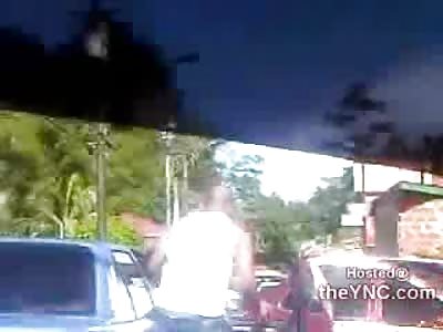 Maniac pulls out a Machete in a Road Rage Fight