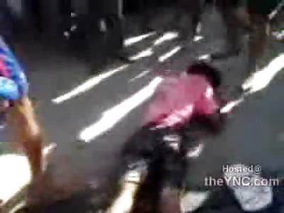 Thief Kicked to Death by Men and Woman seems to be Already Dead