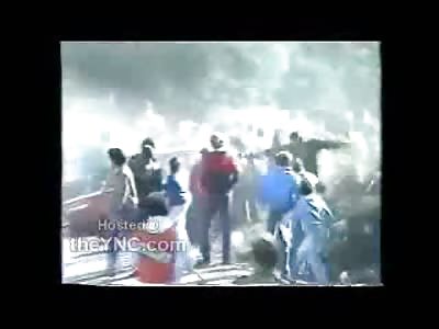 Dazed..Rally Spectator tries to Headbutt Windshield of Moving Rally Car (Watch Slow Motion)