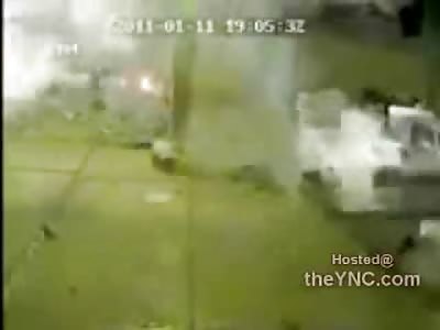 Watch the 2 Men Standing next to the Trunk