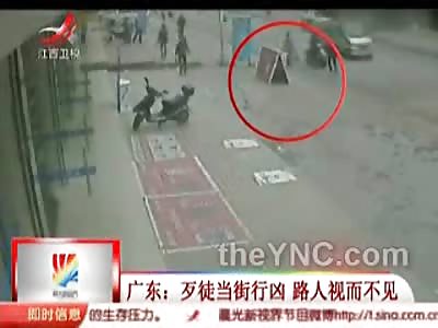 Crazy Lunatic Stabs Woman Walking in the Street Multiple Times