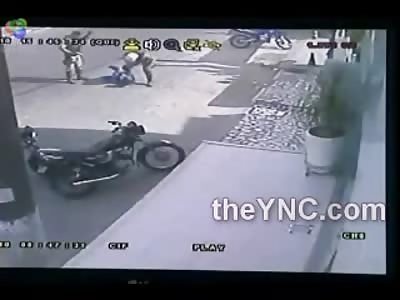 Police in Brazil TEE Off on Teenage Biker in broad Daylight