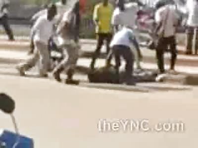 Inquisitive Femae has a Lot of Questions as She Witnesses a Mob Beating in Africa