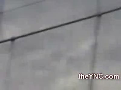 Shaky Video of a Man Jumping to his Death from a Very High Bridge Wire