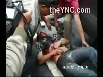 Man Pulled from Car Fights for LIfe on the Street