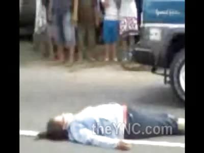 Poor Lady Death Rattles on the Street with major Head Contusion, as People just Drive by and Watch Like its Normal 