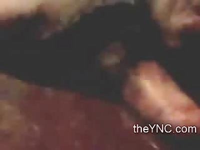 Man with Machete Hacks off the Arm of Bloody Victim in the Street