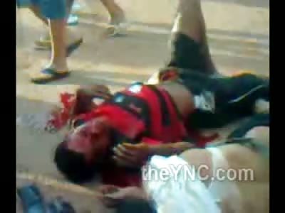 Laying Next to his Dead Wife as He Gasps For Life