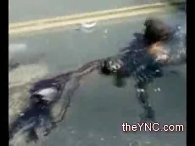 WEEKEND UPDATE: Blood and Fire: Biker Burned to Death by his Bike has Blood mixing as hes Hosed off by Firefighters