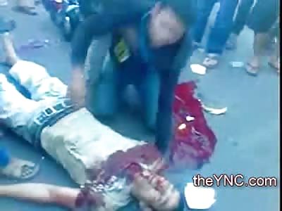 The Departed...Son will not let go and tries to carry the Dead to the Ambulance