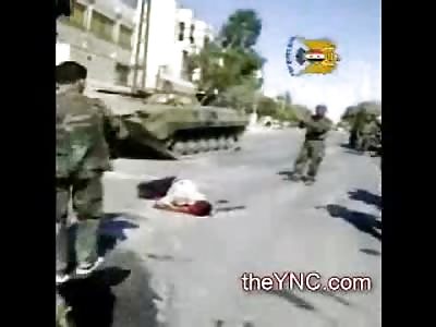 Tough Guys Pump Bullets into Man lying in the Street