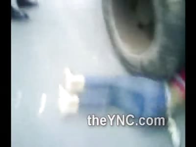 Dead Under the 18 Wheeler Truck's GIant Tires