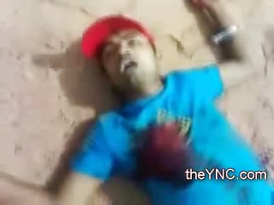 This is Odd: Man Murdered in the Street Gasping as his Killer comes to HELP Him??