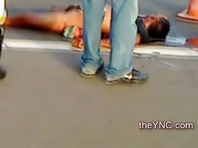 Sneaky Police Officer has to get some Death Footage on Scene