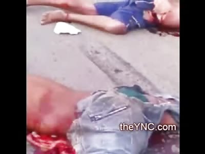 Man Split down the Middle laying in his Own Intestines