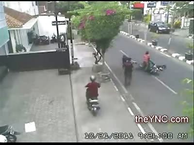 Lucky Bicyclist misses his Death by INCHES after Slipping on the Street